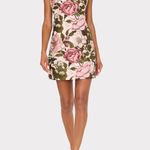 Woman wearing a floral dress on a white background