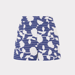 Blue and white floral patterned skirt on a light gray background