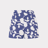 Blue and white floral patterned skirt on a light gray background