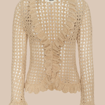 Beige crochet top on a beige background