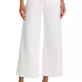 White cropped wide-leg denim jeans worn by a model, paired with beige thong sandals against a clean white background.