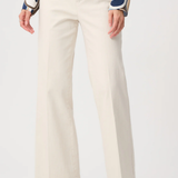 Model wearing white high-rise stretch denim wide-leg jeans with a full-length silhouette.