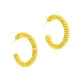 Pair of yellow beaded hoop earrings on a white background