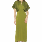 Woman wearing a green dress on a white background
