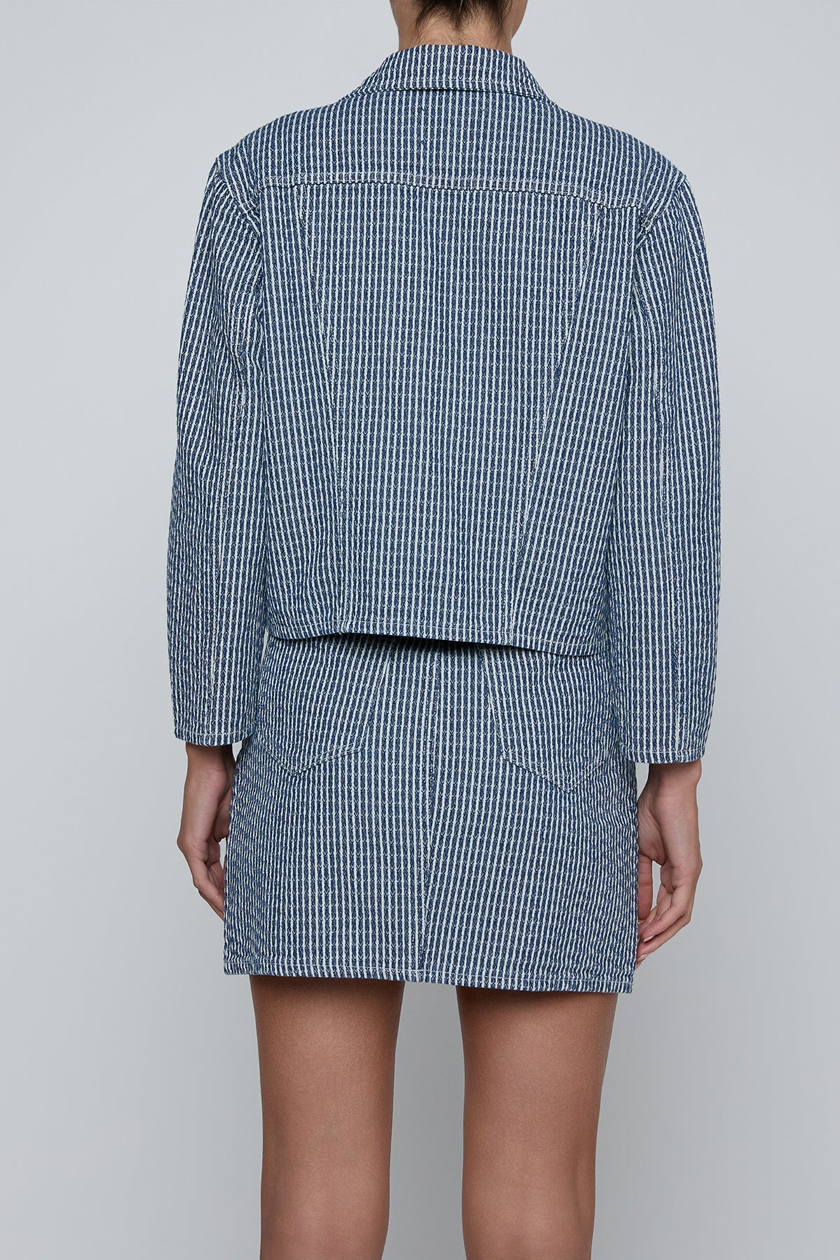 Cropped structured jacket in a blue tone.