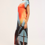 Model wearing a colorful printed sleeveless midi dress.