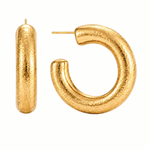 A pair of textured gold hoop earrings, one shown from the front as a capsule shape and the other from the side showing the post, on a solid white background.