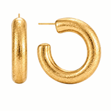 A pair of textured gold hoop earrings, one shown from the front as a capsule shape and the other from the side showing the post, on a solid white background.