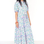 Woman wearing a floral dress on a white background