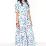 Woman wearing a floral dress on a white background