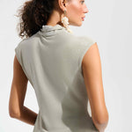 Champagne sparkle knit wrap top with rhinestone embellishment