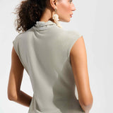 Champagne sparkle knit wrap top with rhinestone embellishment