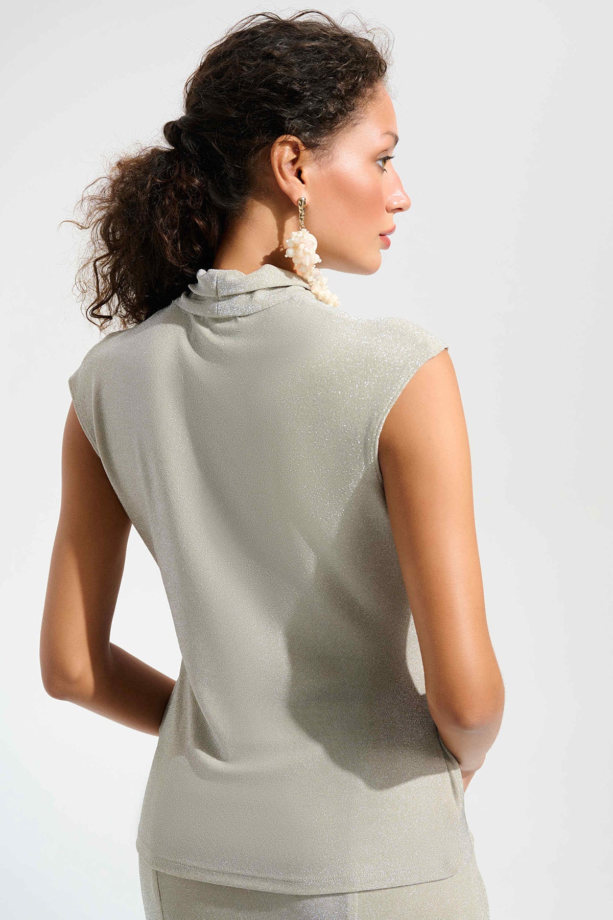 Champagne sparkle knit wrap top with rhinestone embellishment