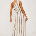 Woman wearing a striped jumpsuit on a white background