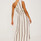 Woman wearing a striped jumpsuit on a white background