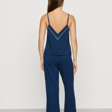 Navy blue Tencel™ modal pajama set featuring a V-neck camisole and matching full-length pants.