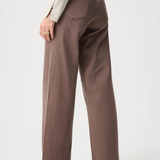 Women's wide-leg stretch jeans featuring a high-rise waist, classic five-pocket styling, and a full-length silhouette.