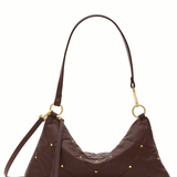A dark brown quilted leather shoulder bag with gold-tone studs and hardware, shown against a plain white background.