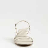 White sandal on a light gray background