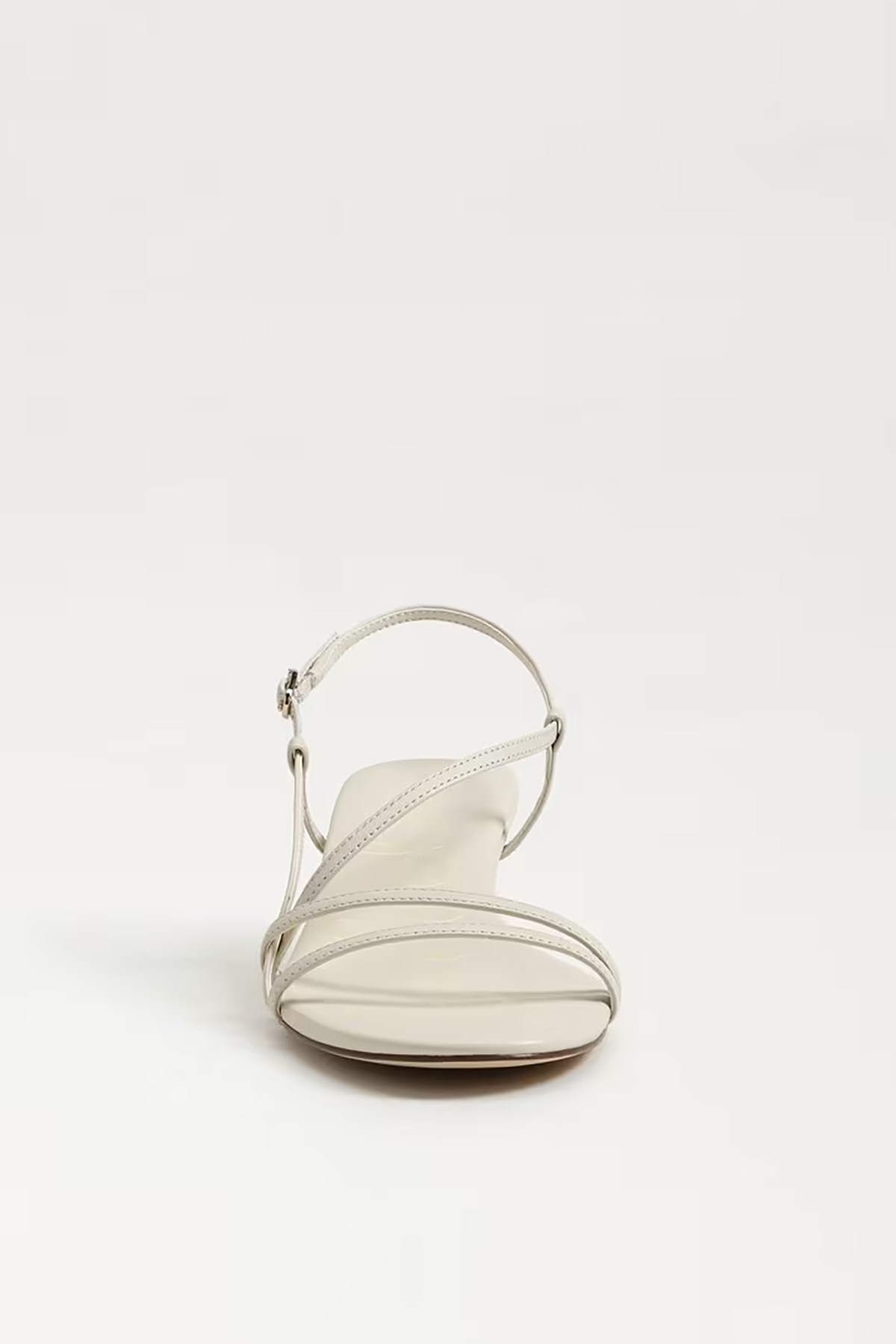 White sandal on a light gray background