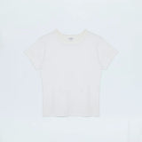Minimal white top with a clean neckline and streamlined fit.