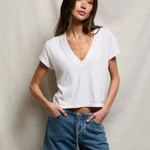 woman in white t-shirt  and denim 