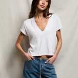 woman in white t-shirt  and denim 