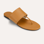 brown flat sandals on white background 