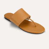 brown flat sandals on white background 