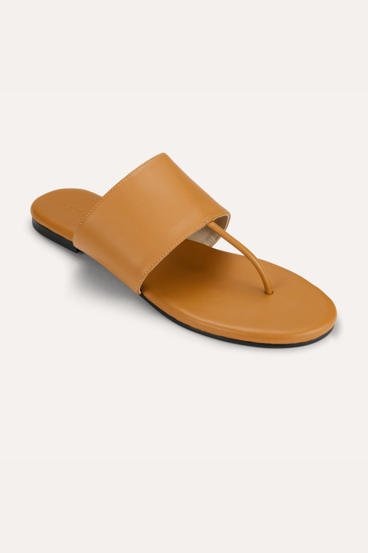 brown flat sandals on white background 
