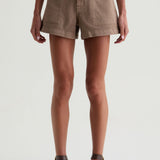 Person wearing brown shorts on a white background