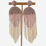 Beaded and chain detail earrings on gold stand featured on a white background.