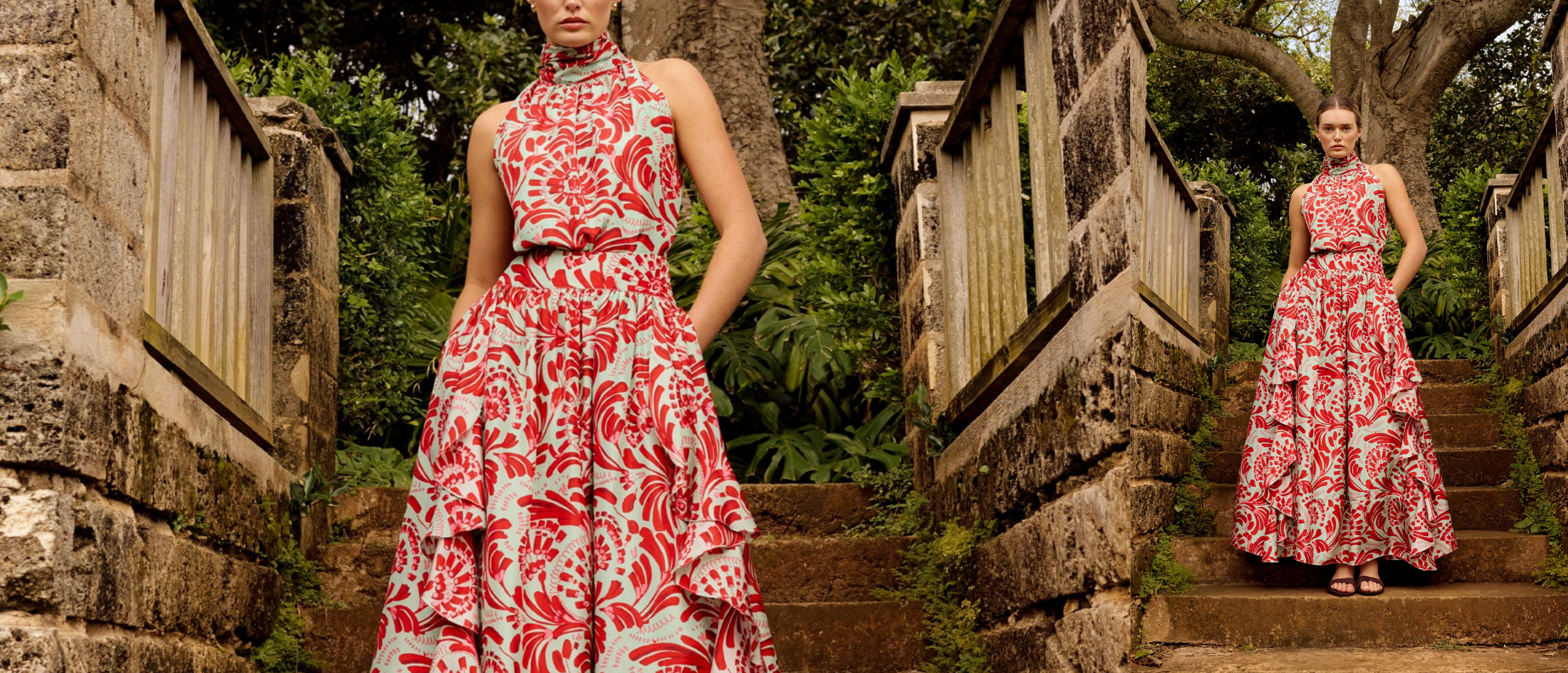 Woman in a red and white floral dress standing on stone steps in an outdoor setting.