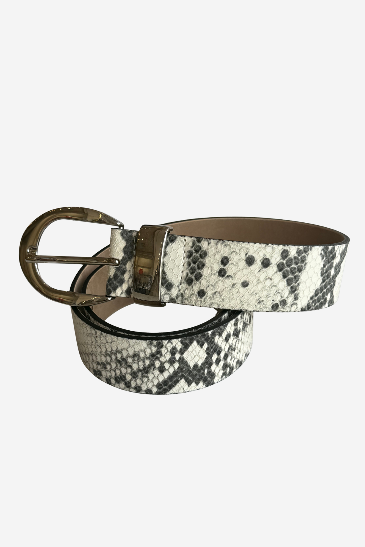 A snakeskin-patterned leather belt with a black and white python print and a bronze-tone metal buckle, coiled on a light gray background.