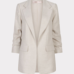 light beige blazer against a white background