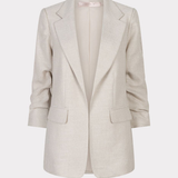 light beige blazer against a white background
