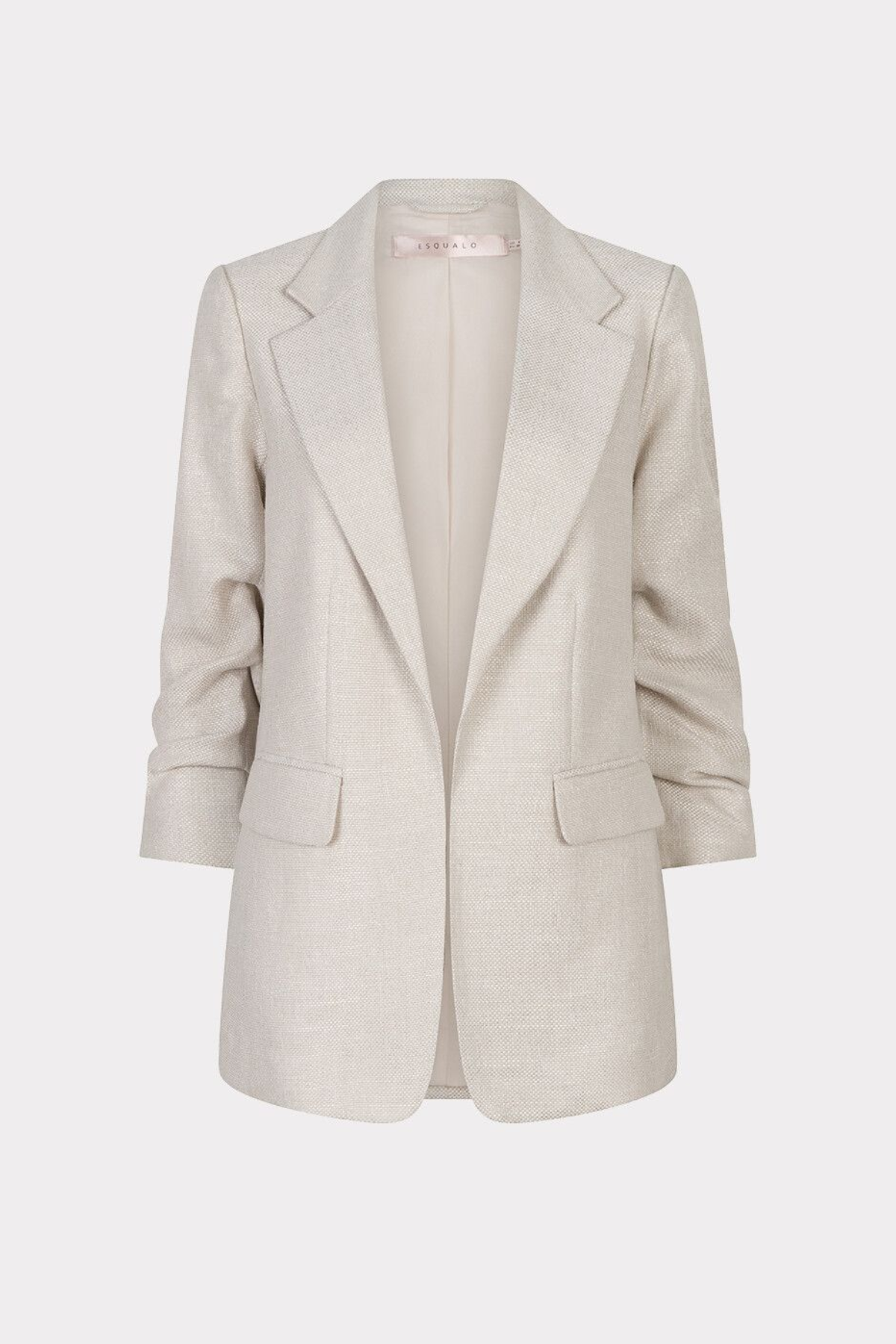 light beige blazer against a white background