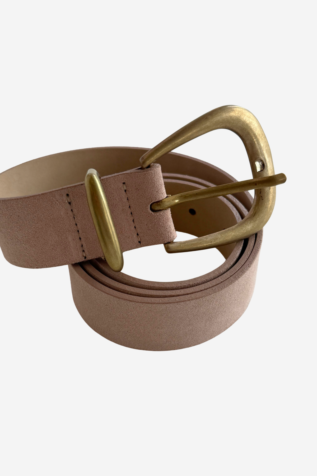 Dusty pink colored belt on plain white background