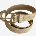 Cowhide belt on white background.