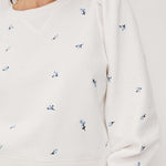 Rails Tiffany white sweatshirt with small embroidered floral motifs and relaxed fit.