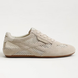 Beige sneaker with perforated design on a white background