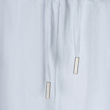 Light blue pants with drawstring and metal zippers on a white background