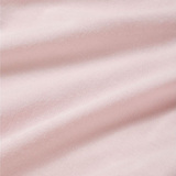 Close-up of soft pink fabric with subtle texture