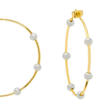 Gold hoop earrings with evenly spaced white pearl-like beads, shown on a clean white background.