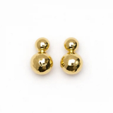 A pair of gold-tone double ball stud earrings on a clean white background.