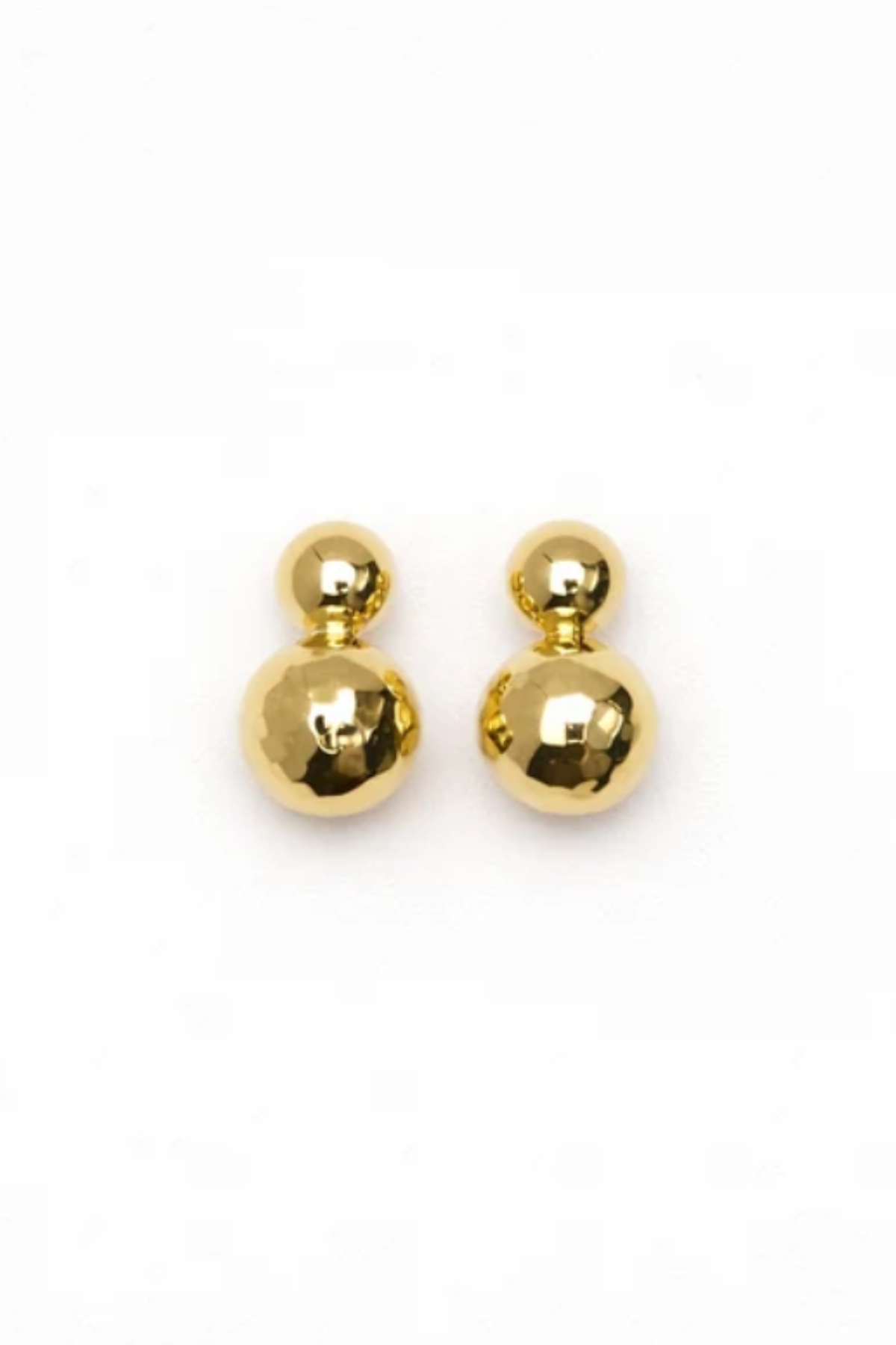 A pair of gold-tone double ball stud earrings on a clean white background.