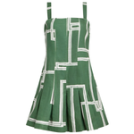 A green sleeveless mini dress with a white geometric line pattern, featuring thin shoulder straps and a flared pleated skirt, shown against a plain white background.