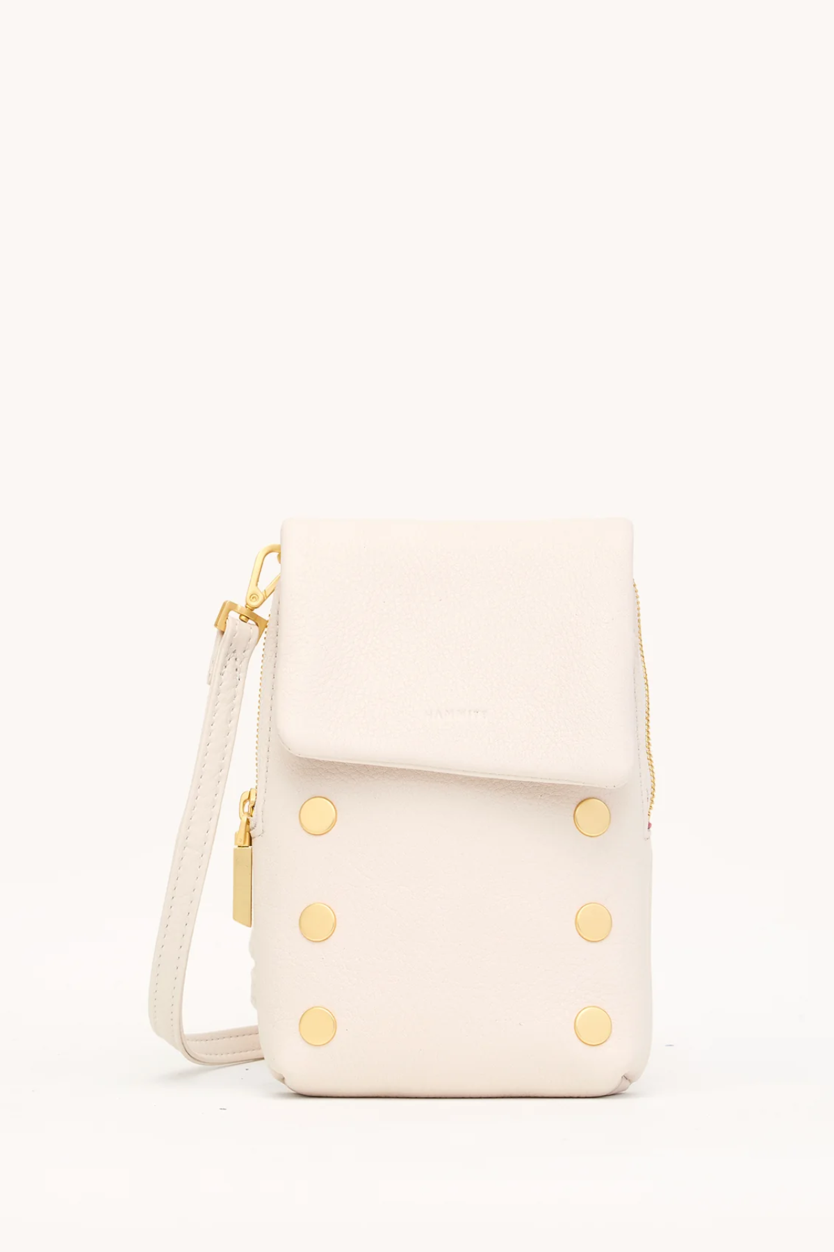 White handbag with gold buttons on a white background
