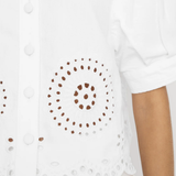 close up on white eyelet fabric 