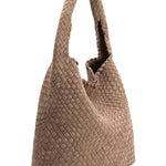 Beige woven handbag on a white background
